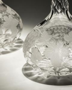 A FINE PAIR OF ENGRAVED SHAFT GLOBE DECANTERS - 4340911