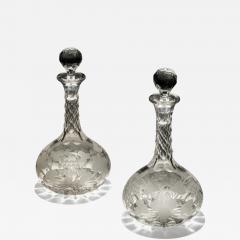 A FINE PAIR OF ENGRAVED SHAFT GLOBE DECANTERS - 4344268