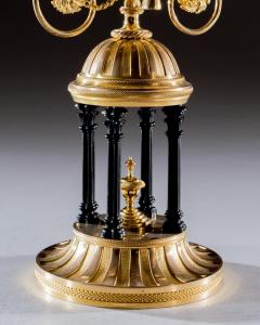 A FINE PAIR OF ORMOLU AND BRONZE TEMPLE CANDELABRA - 3787290