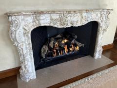 A Finely Carved Louis XV Style Fireplace Mantel in Figured Italian Marbl - 4587388