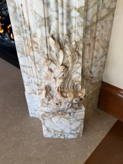 A Finely Carved Louis XV Style Fireplace Mantel in Figured Italian Marbl - 4587391