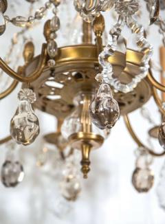 A Finely Cast Bronze and Crystal Eight Arm Chandelier - 2950620