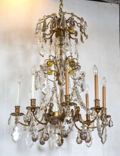A Finely Cast Bronze and Crystal Eight Arm Chandelier - 2950621