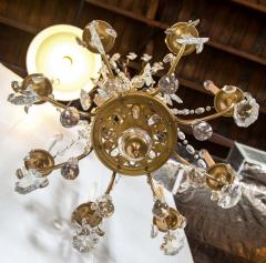 A Finely Cast Bronze and Crystal Eight Arm Chandelier - 2950622