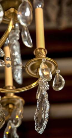 A Finely Cast Bronze and Crystal Eight Arm Chandelier - 2950626