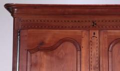 A French cherry armoire with inlay circa 1800  - 3781026