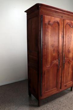 A French cherry armoire with inlay circa 1800  - 3781028