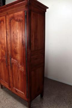 A French cherry armoire with inlay circa 1800  - 3781029