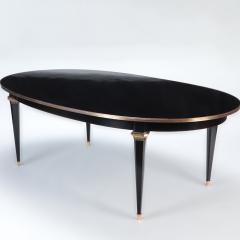 A French oval ebonized mahogany dining room table circa 1940  - 2969523
