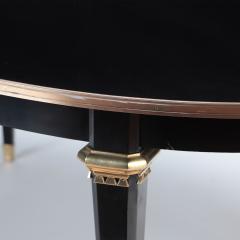 A French oval ebonized mahogany dining room table circa 1940  - 2969526