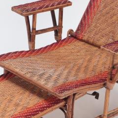 A French rattan Chaise Longue with orange and red stripes circa 1900  - 2835764