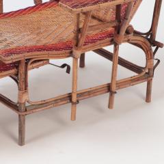 A French rattan Chaise Longue with orange and red stripes circa 1900  - 2835765