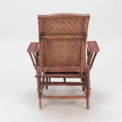 A French rattan Chaise Longue with orange and red stripes circa 1900  - 2835766