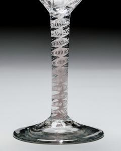 A GENEROUS PANEL MOULDED OPAQUE TWIST WINE GLASS - 4752690