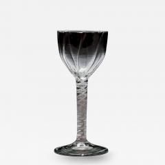 A GENEROUS PANEL MOULDED OPAQUE TWIST WINE GLASS - 4752789
