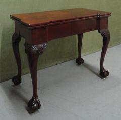 A GEORGE II MAHOGANY GAMES TABLE - 3562847