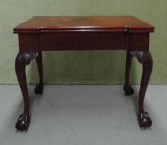 A GEORGE II MAHOGANY GAMES TABLE - 3562851