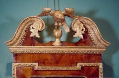 A GEORGE II WALNUT AND PARCEL GILT MIRROR - 1641909