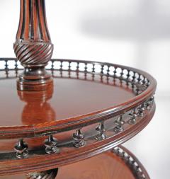 A GEORGE III MAHOGANY THREE TIER DUMBWAITER - 2771702