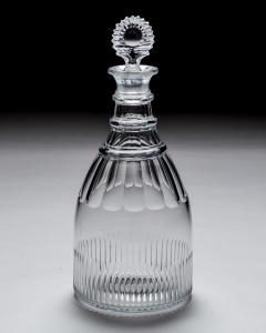 A GEORGIAN SLICE FLUTE MAGNUM DECANTER WITH SUNBURST STOPPER - 4290292