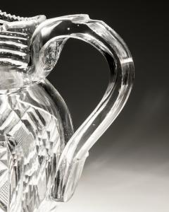 A HEAVILY CUT GLASS CREAM JUG - 4340914