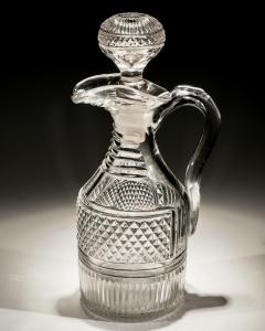 A HEAVILY CUT REGENCY CLARET JUG - 3793698