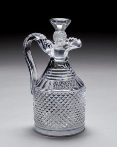 A HEAVILY CUT REGENCY CLARET JUG - 4399370