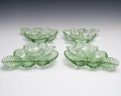 A HIGHLY UNUSUAL SUITE OF GREEN FEATHER CUT WILLIAM IV BOWLS - 3792918