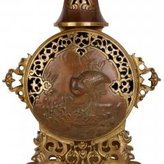 A Japonisme gilt bronze and brass three piece clock set - 4121637