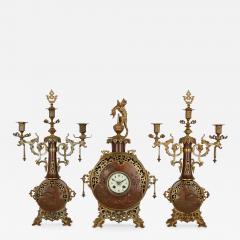 A Japonisme gilt bronze and brass three piece clock set - 4121947