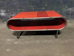 A Krynsky Capsule Shaped Cocktail table made from bent steel tubing and reclaimed metal - 4033429