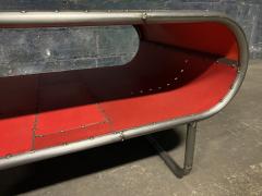 A Krynsky Capsule Shaped Cocktail table made from bent steel tubing and reclaimed metal - 4033436