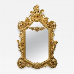 A LARGE FRENCH ROCOCO STYLE GILT WOOD FIGURAL WALL MIRROR - 3560145