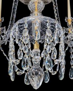 A LARGE GEORGE III STYLE 12 LIGHT CRYSTAL CHANDELIER - 3787556