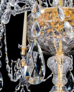 A LARGE GEORGE III STYLE 12 LIGHT CRYSTAL CHANDELIER - 3787634