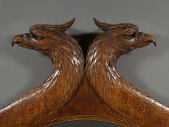 A Large Carved Oak Mirror Surmounted By Addorsed Eagle Heads - 1307685