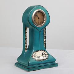 A Little Turquoise Blue Dressing Table Clock Decorated with Cherubs by a Tree - 4186859
