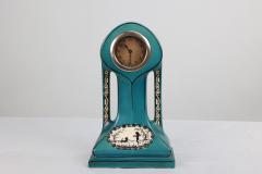 A Little Turquoise Blue Dressing Table Clock Decorated with Cherubs by a Tree - 4186862
