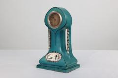 A Little Turquoise Blue Dressing Table Clock Decorated with Cherubs by a Tree - 4186864