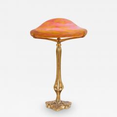 A Louis Majorelle and Daum Nancy Gilt Bronze and Pink Glass Table Lamp - 3475311