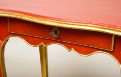 A Louis XV Style Table in Orange with Gold Leaf Accents - 1311131