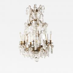 A Louis XV period gilded bronze rock crystal chandelier - 1530475