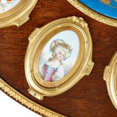 A M E Fournier Neoclassical style porcelain and gilt bronze mounted circular table by Fournier - 2418601