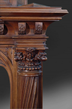 A MONUMENTAL ENGLISH GOTHIC STYLE CARVED WALNUT FIREPLACE - 3537599
