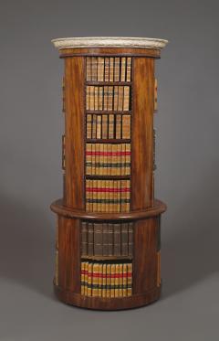 A Mahogany Circular Bookcase With A Statuary Dished Marble Top - 1305261