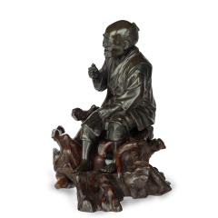 A Meiji period bronze of a seated man smoking - 3456856