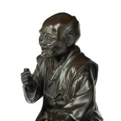 A Meiji period bronze of a seated man smoking - 3456859