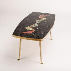 A Mid Century German coffee table with a mosaic top on brass metal legs - 1697327