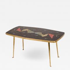 A Mid Century German coffee table with a mosaic top on brass metal legs - 1698286