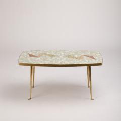 A Mid Century German coffee table with mosaic top on tapered brass legs - 1697311